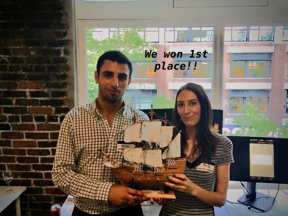 Abbey and her bootcamp partner holding the first-place trophy